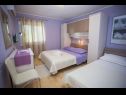 Ferienwohnungen Palmina - comfort apartment: A1 veliki (6),  A2 žuti (4+1), A3 lila (2), SA4 bijeli (2) Makarska - Riviera Makarska  - Ferienwohnung - A1 veliki (6): Schlafzimmer
