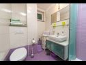 Ferienwohnungen Palmina - comfort apartment: A1 veliki (6),  A2 žuti (4+1), A3 lila (2), SA4 bijeli (2) Makarska - Riviera Makarska  - Ferienwohnung -  A2 žuti (4+1): Badezimmer mit Toilette