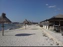 Ferienwohnungen Tomi - with large terrace (60m2): A1(4) Trogir - Riviera Trogir  - Strand