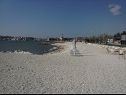 Ferienwohnungen Tomi - with large terrace (60m2): A1(4) Trogir - Riviera Trogir  - Strand